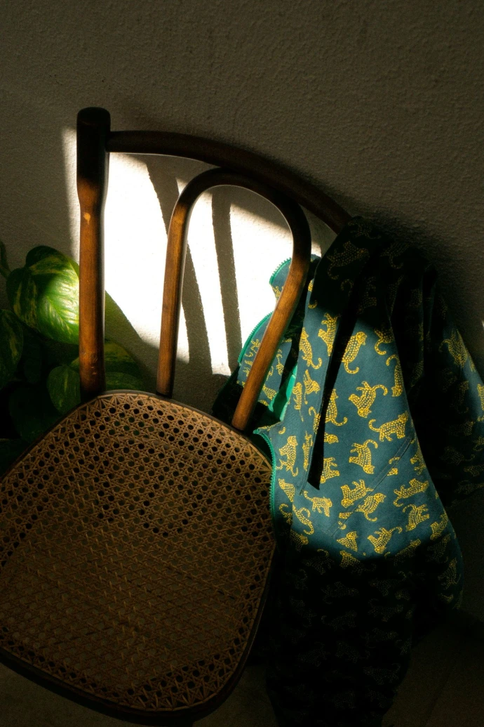 a couple of vases sit on a table